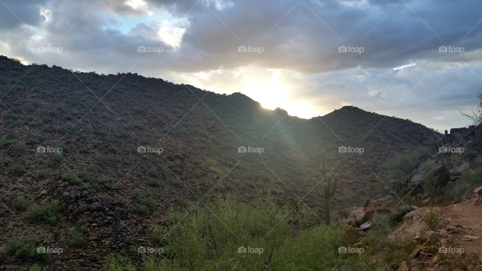 Sun Rising Over Arizona Mounta. Sunrise on Sunrise Trail Scottsdale Arizona McDowell Mountains