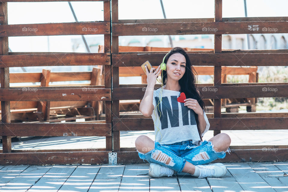 Young girl is enjoying music