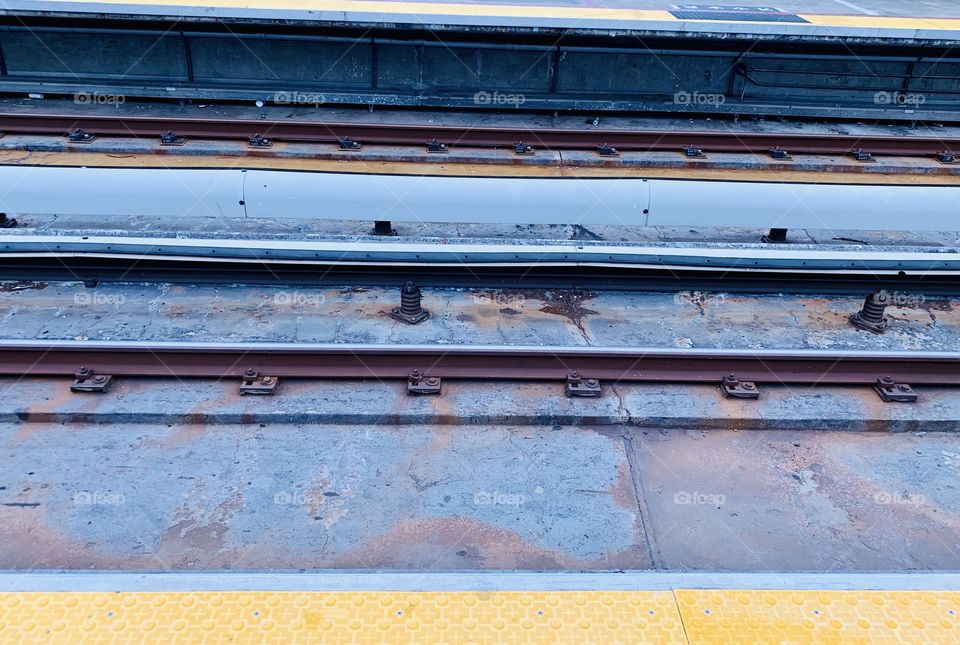 The bart train pulling up to an empty station (during quarantine)