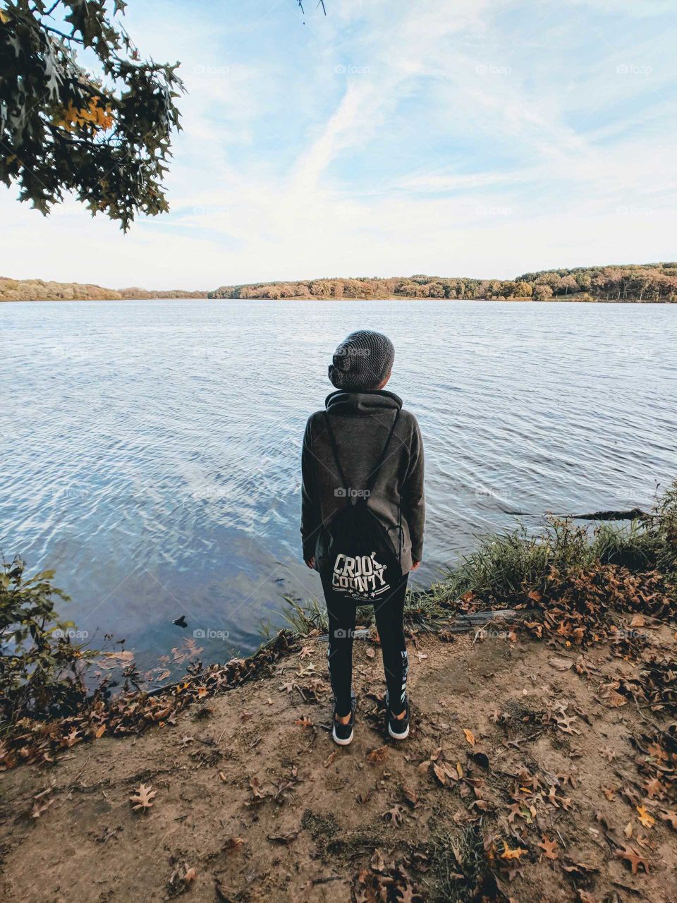 Standing on the edge of a lake