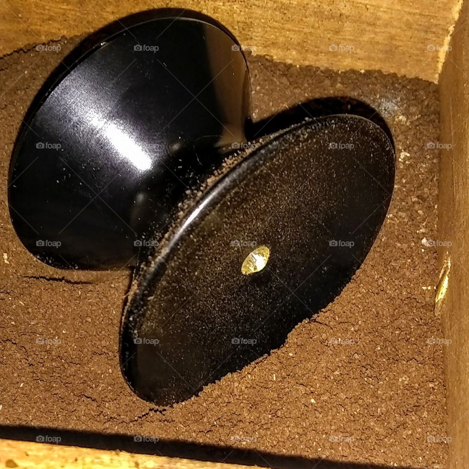 My first Amazon order. Gourmet Espresso Tamper 2005.
Description
The new shape of brewing richer espresso. Individually crafted in USA. The contemporary design is a "must" for connousseurs of fine cafe espresso technique. Created to reduce bitter oils and improve the extraction of rich coffee flavor. The result is true ambrosia with an exceptional bouquet and robust crema. The unique design impacts optimum espresso preparation at home by improving the water stream distribution over the puck. Heat resistant and dishwasher safe. Cherished as the most intimate tool in the home espresso preparation ritual.