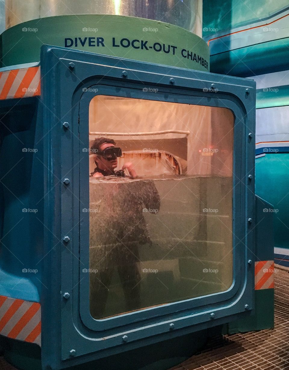 Locked in the dive tank to perform a diving demonstration.  This guy was fun to watch as he swam around in there. 