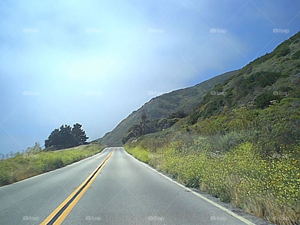 Road by mountains
