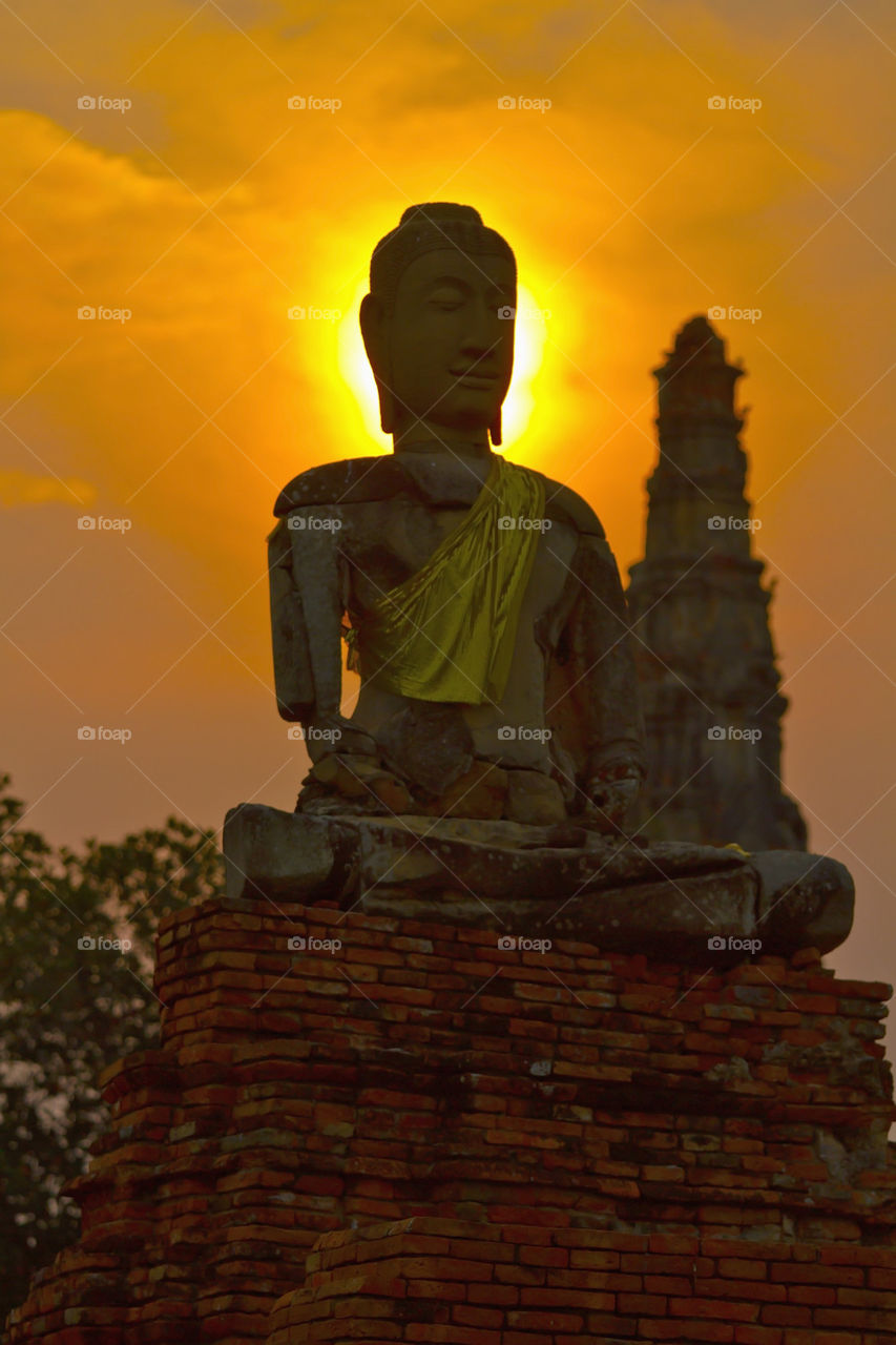 sunset statue silhouette thailand by sonchai