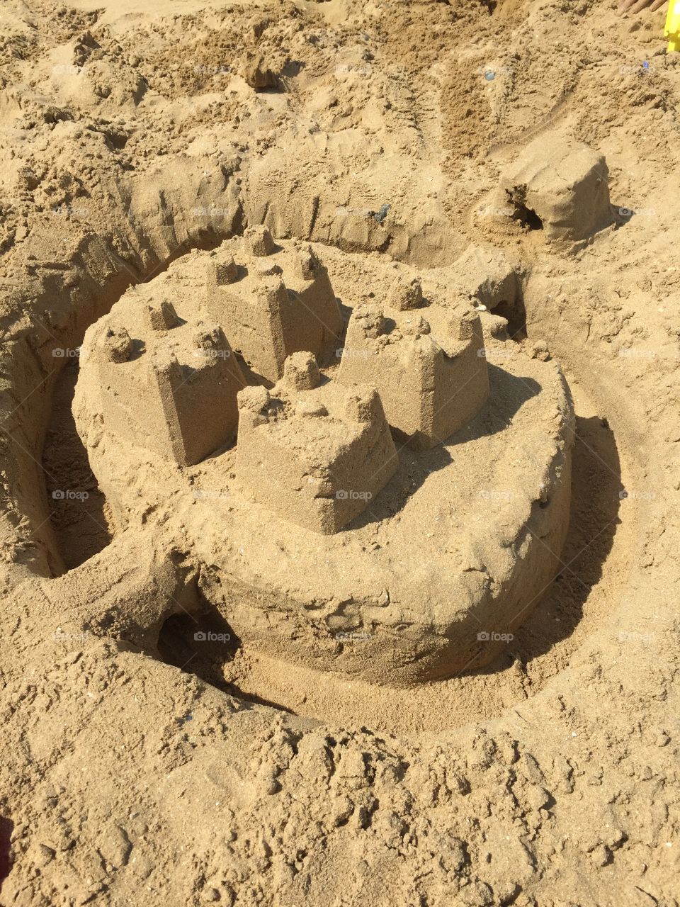 Castle . Day at the beach on a hot day with family and made my very first sand castle! So proud! 