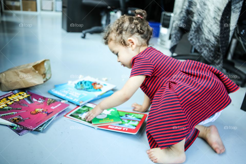 Little girl reading 