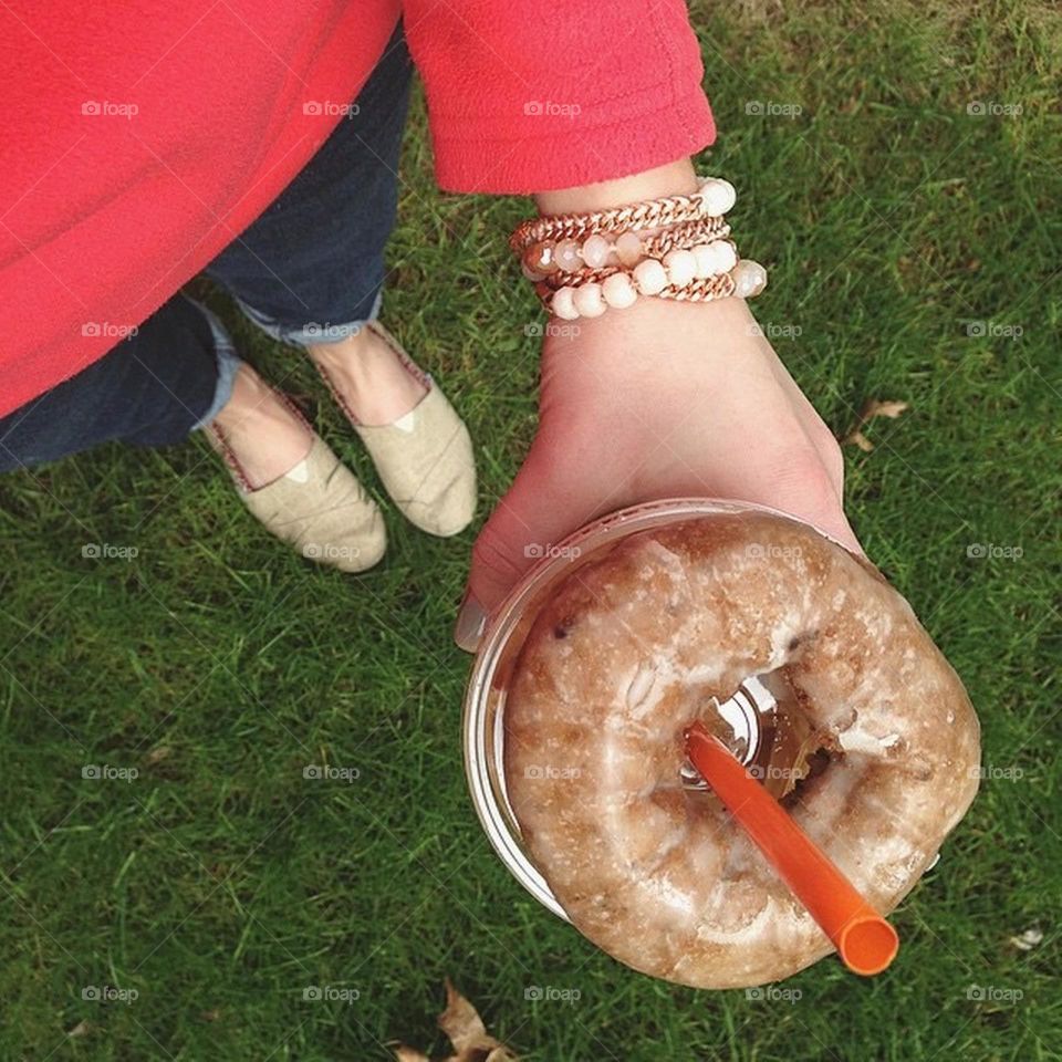 Coffee and donuts in hand