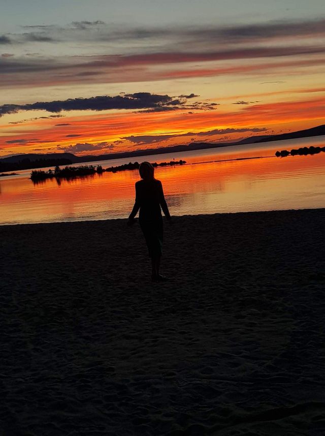 women in sunset