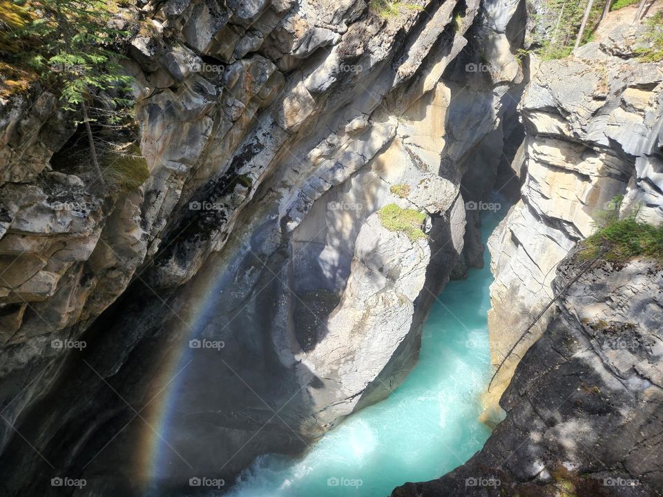 Rainbow inside an ice water Canyons