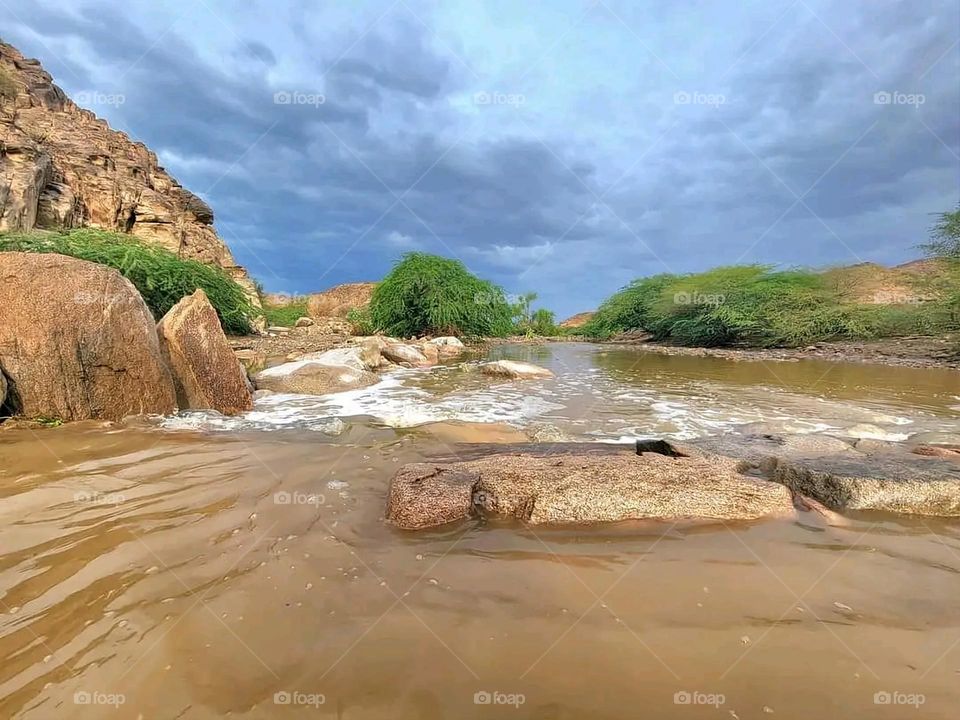 Glory be to God, the magnificent and picturesque view and the natural green trees are a view that is nothing more wonderful than it