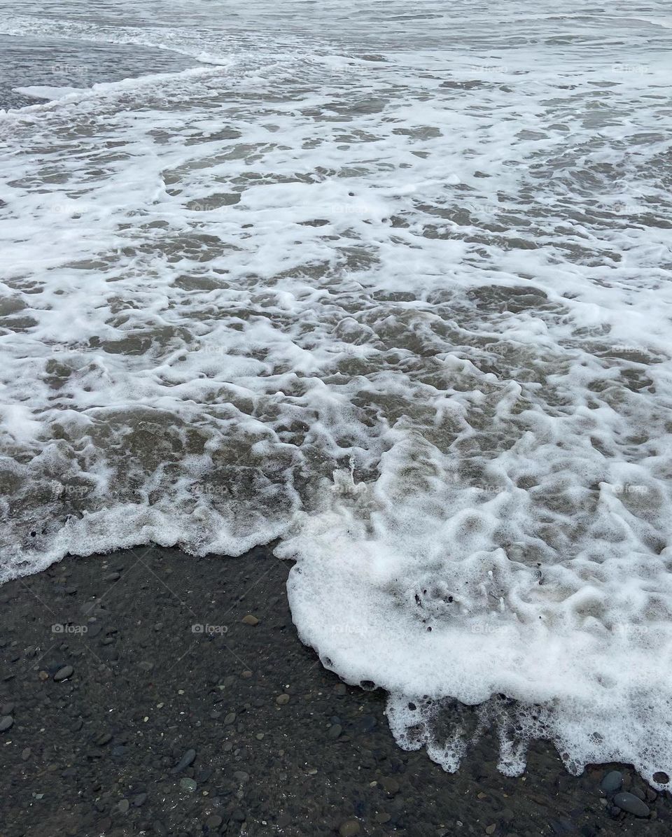 Waves crash on the shore