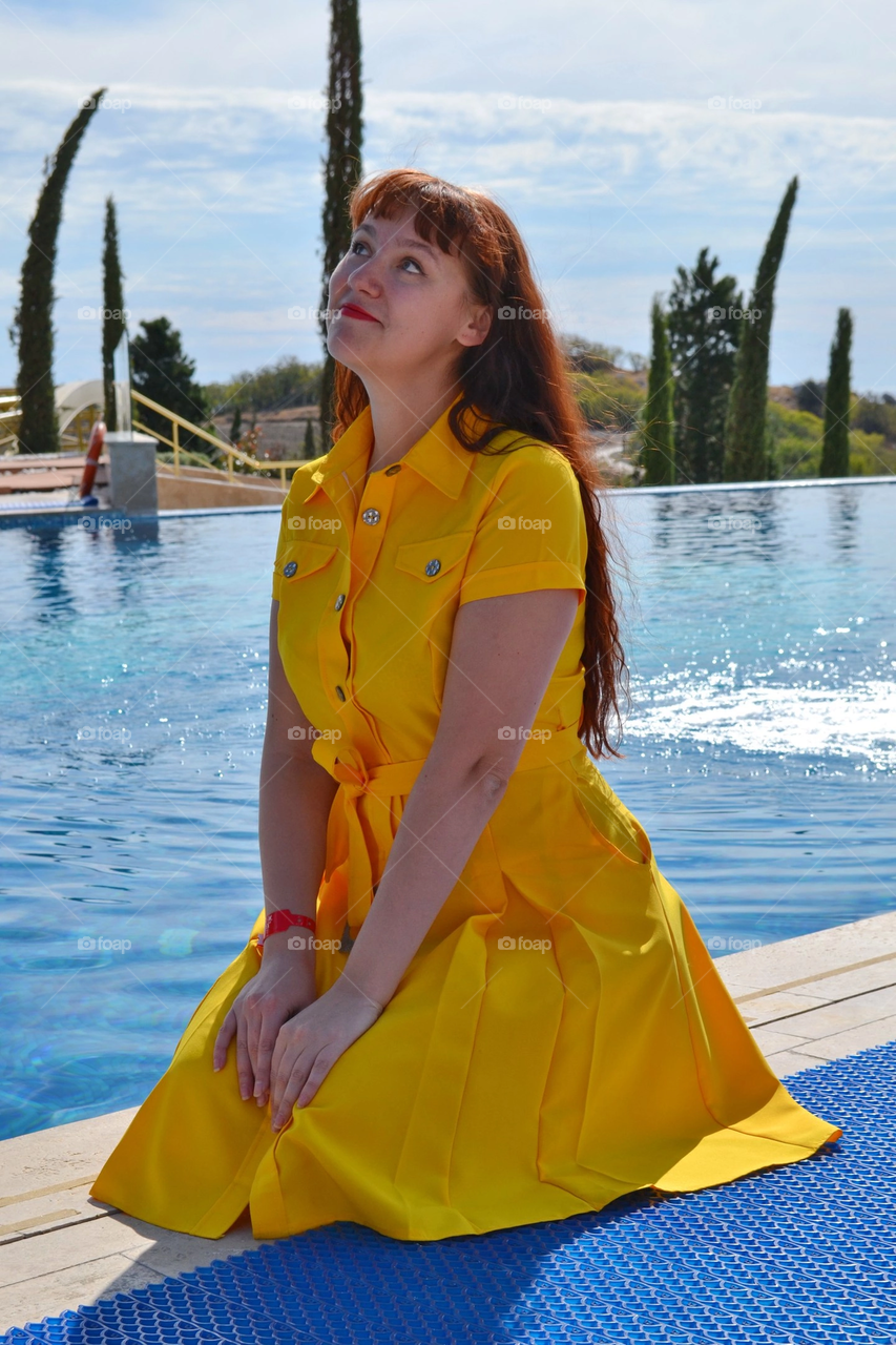 Woman in yellow dress 