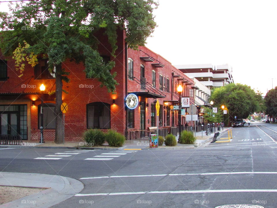 historic red brick building on a Street in downtown Sacramento California