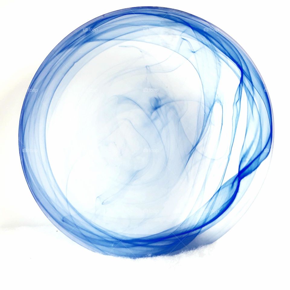 bright and light high key picture from a swirl glass blue and white bowl