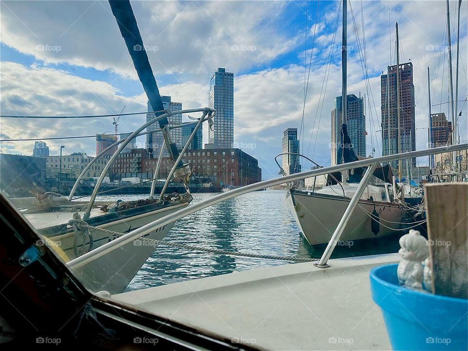 This is “Newtown Creek” by the “Pulaski Bridge” in LIC, Queens seen from “Salvation”, the “28 ft 1969 Luhrs” cabin cruiser I and my longtime partner “Timothy Trespas” call home. “Greenpoint”, Bklyn can be seen on the left. 2023. Hypnotic Productions