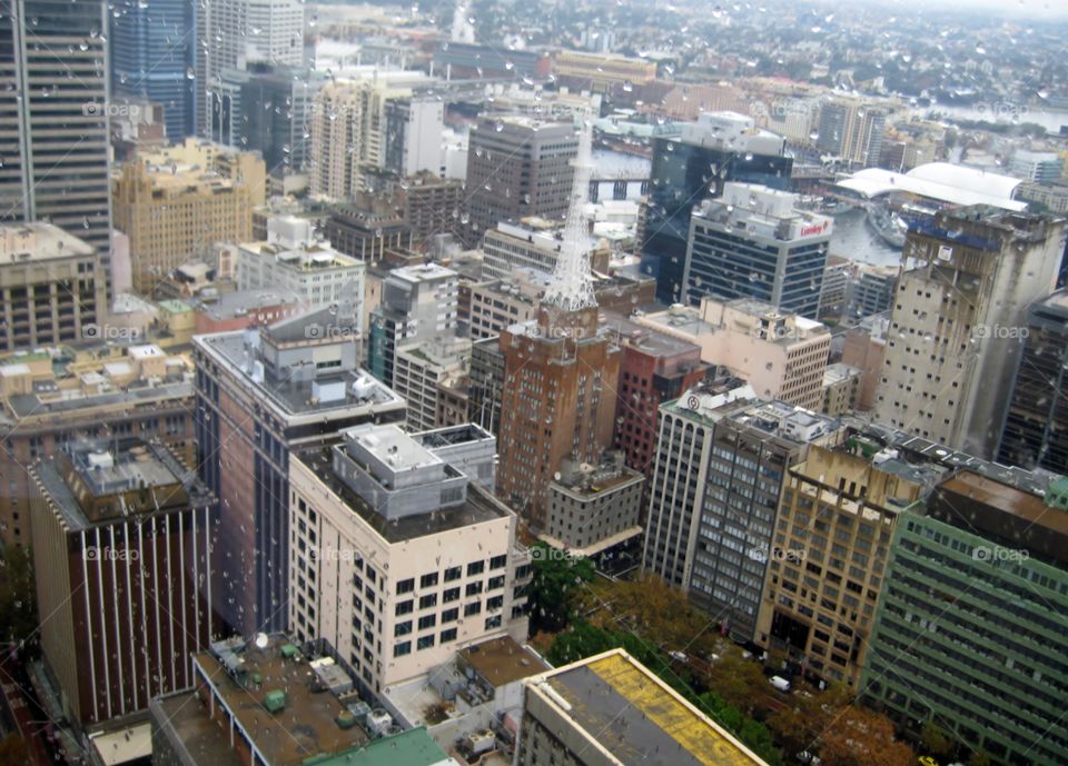 Sydney From High. View thru Window and Raindrops