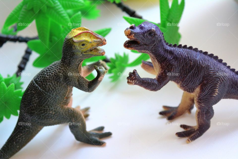 dinosaurs toys playing