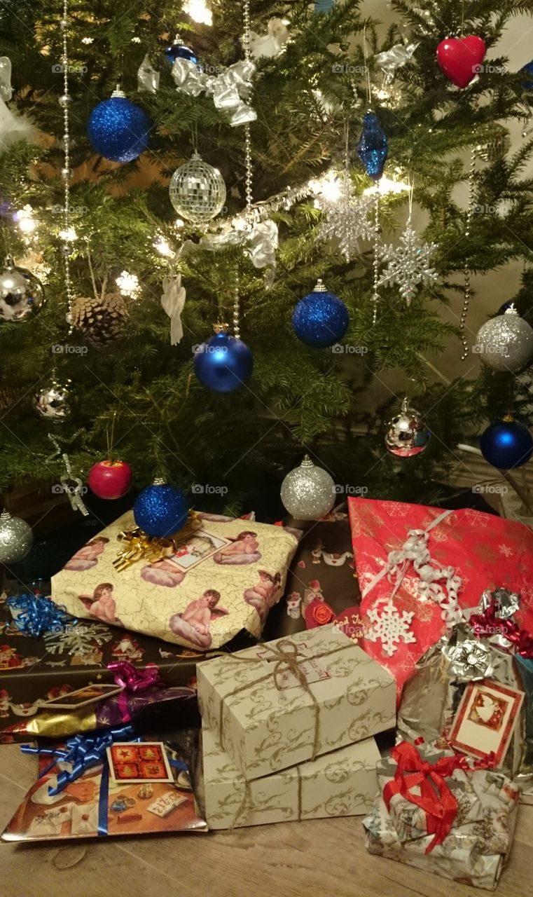 Christmas gift under the tree. Christmas gifts under the christmas tree