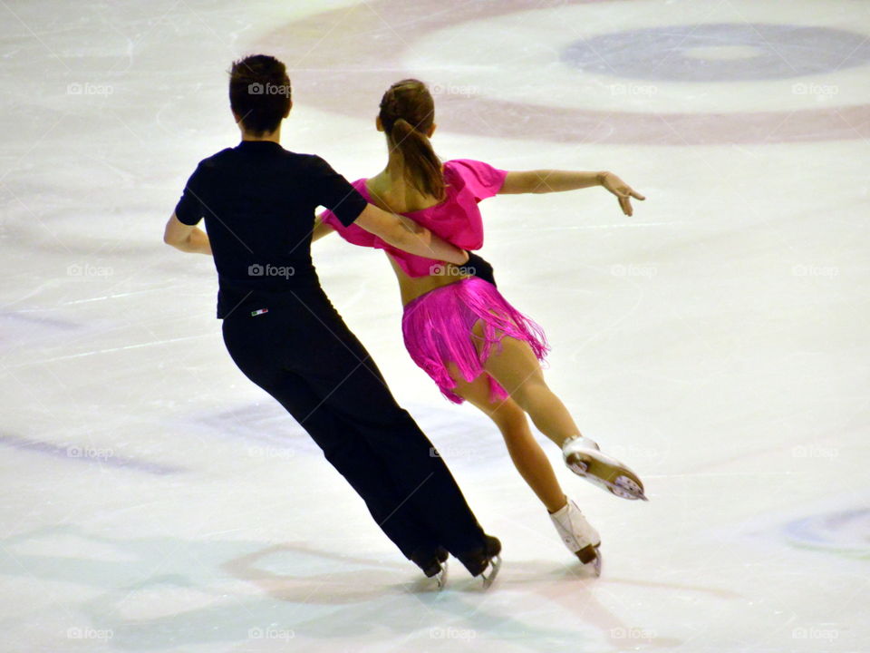 ice skating, dancing couple