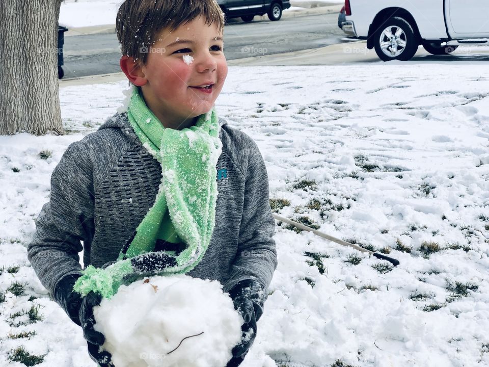 Uh oh! Someone has a giant snowball for the snowball fight! 