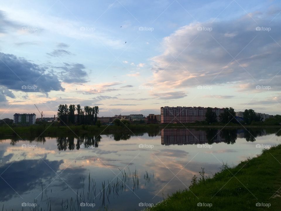 Cityscape reflection in a lake