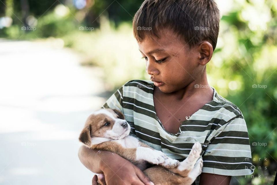 Proudly shows off his puppy