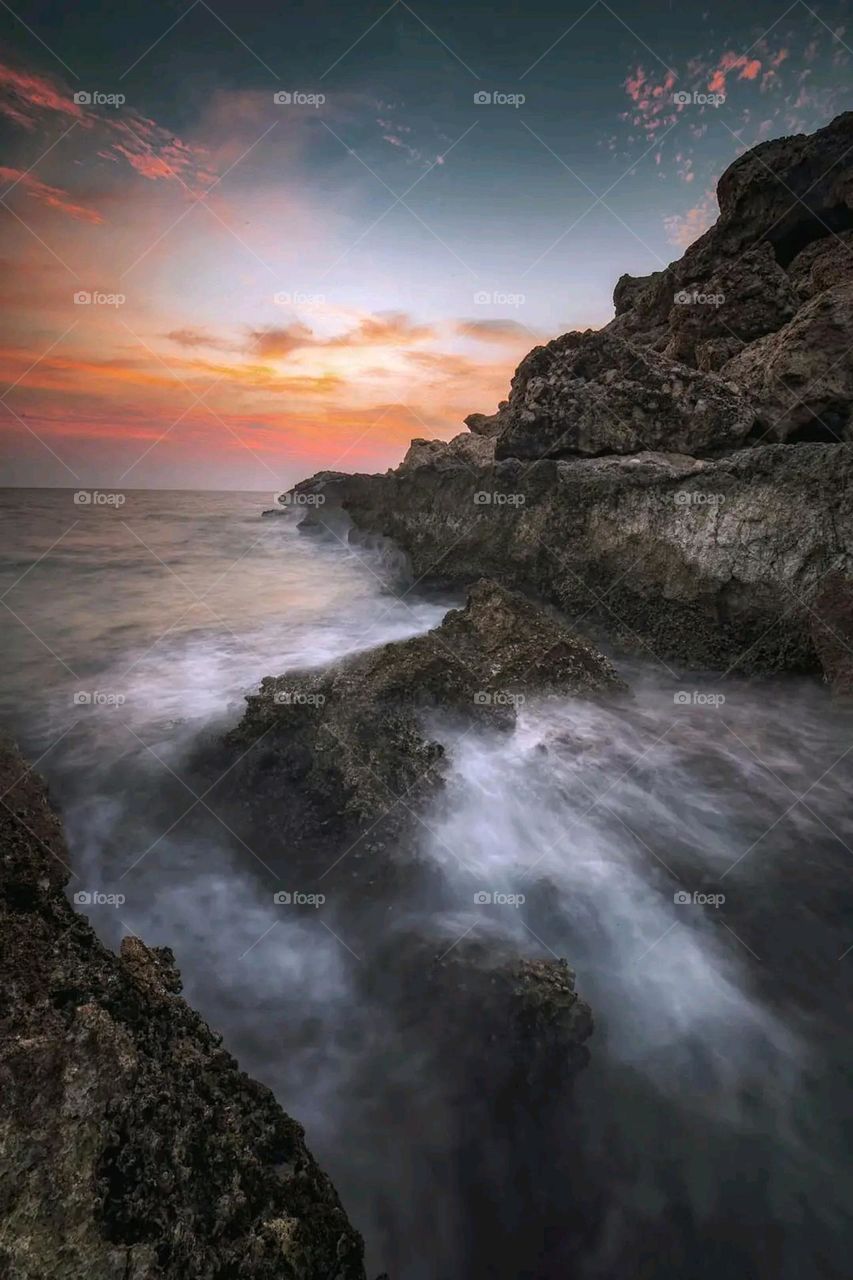 A stunning view of green mountains covered in fog in Yemen