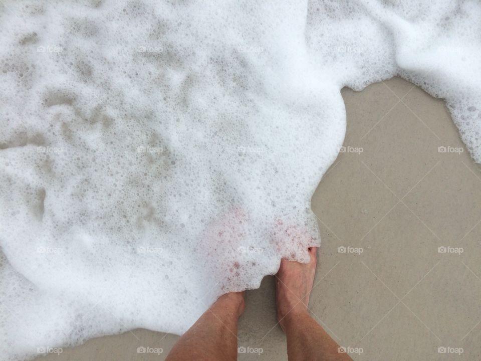 Quick dip of my feet standing on the coast of Florida beaches anticipating the Hurricane to hit the coast line.  