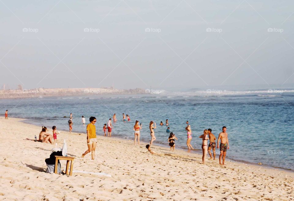 crowd on the beach in Bali