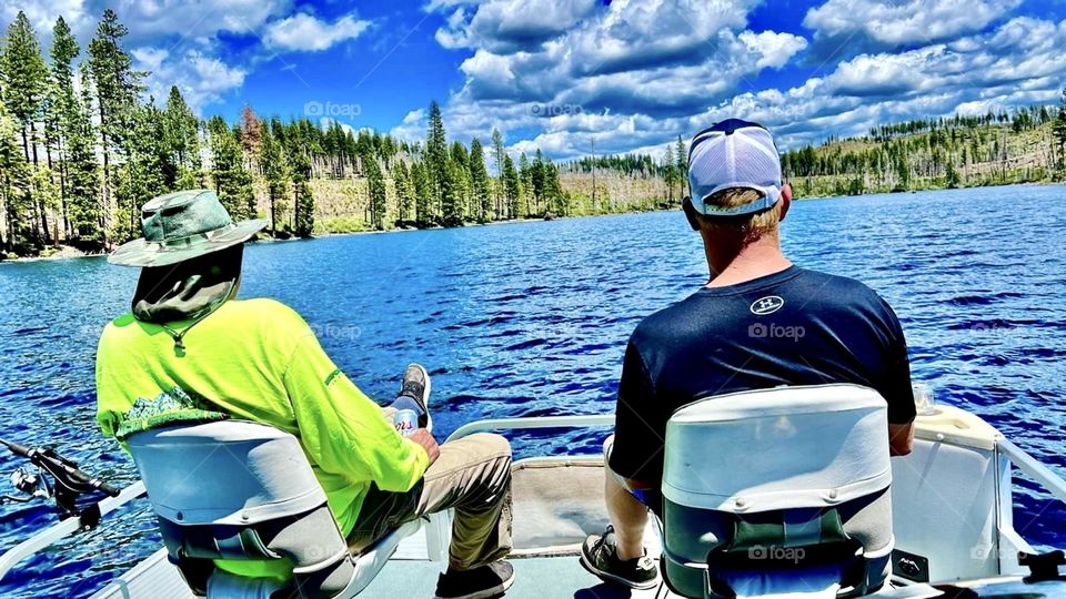 Pontoon, pretty skies and water