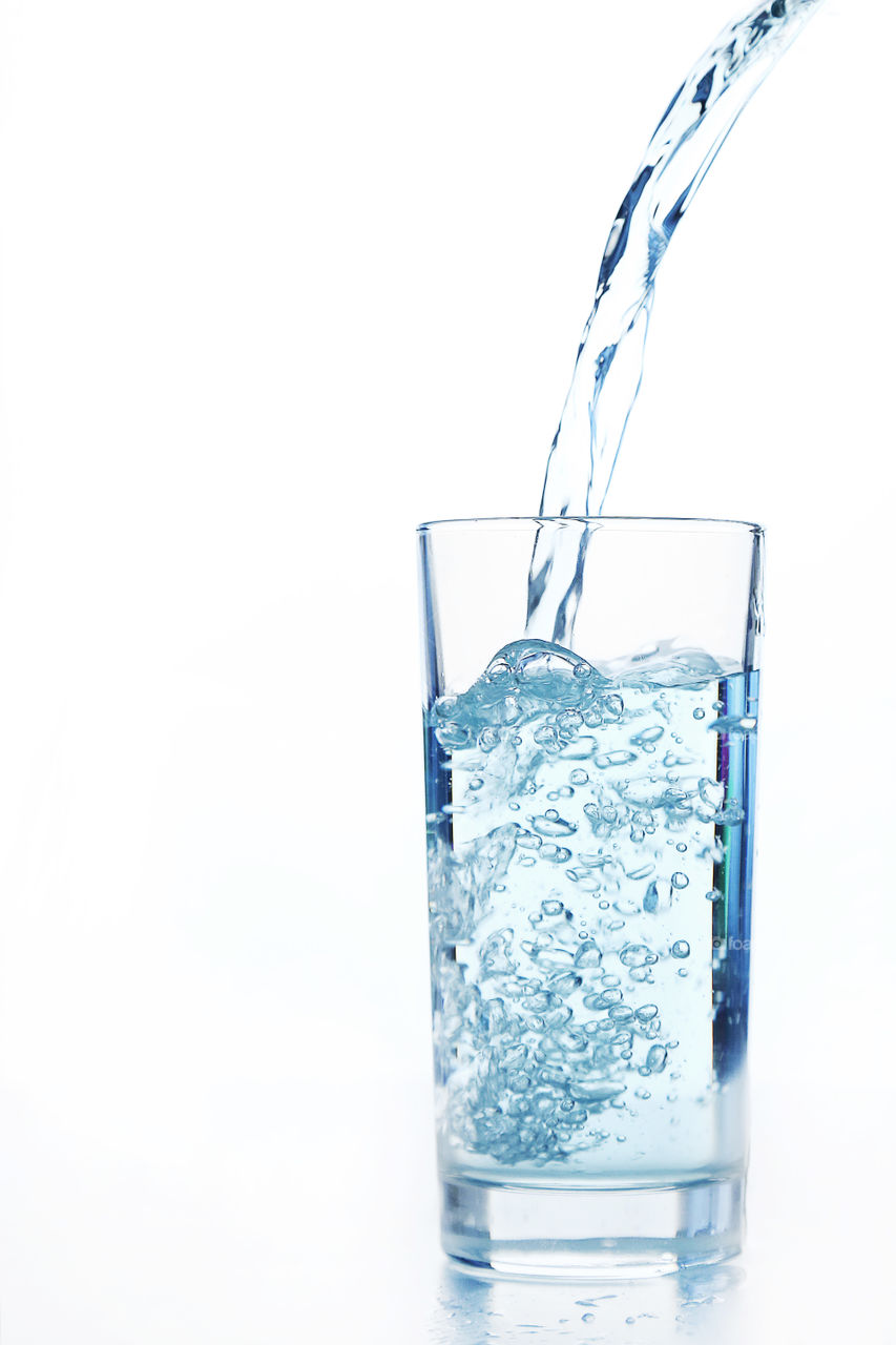 Glass with fresh water. Splash water