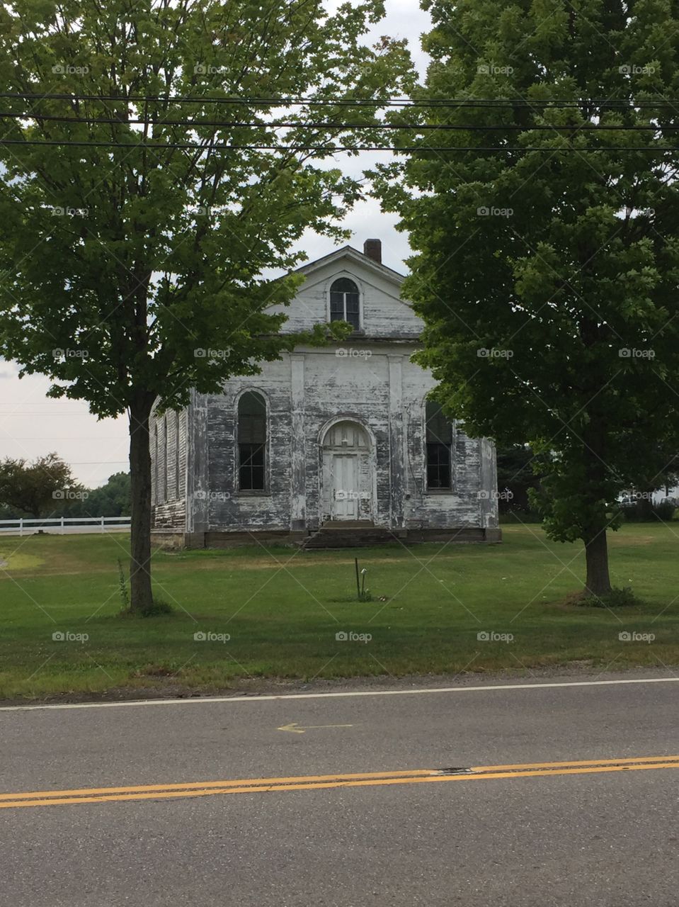 Old abandoned church /school house in the country 