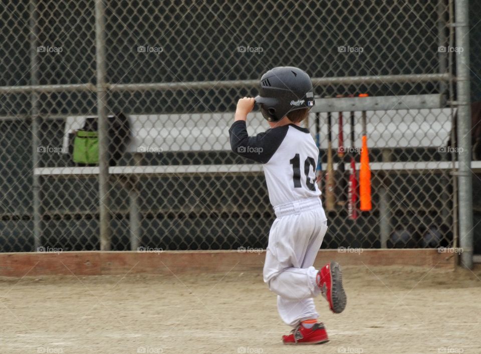 Young Baseball Player. Young T-Ball Player Running The Bases
