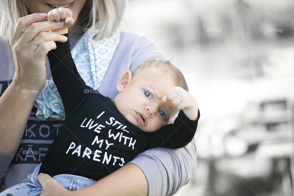 Mother holding baby boy