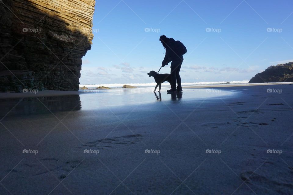 Beach#sea#human#dog