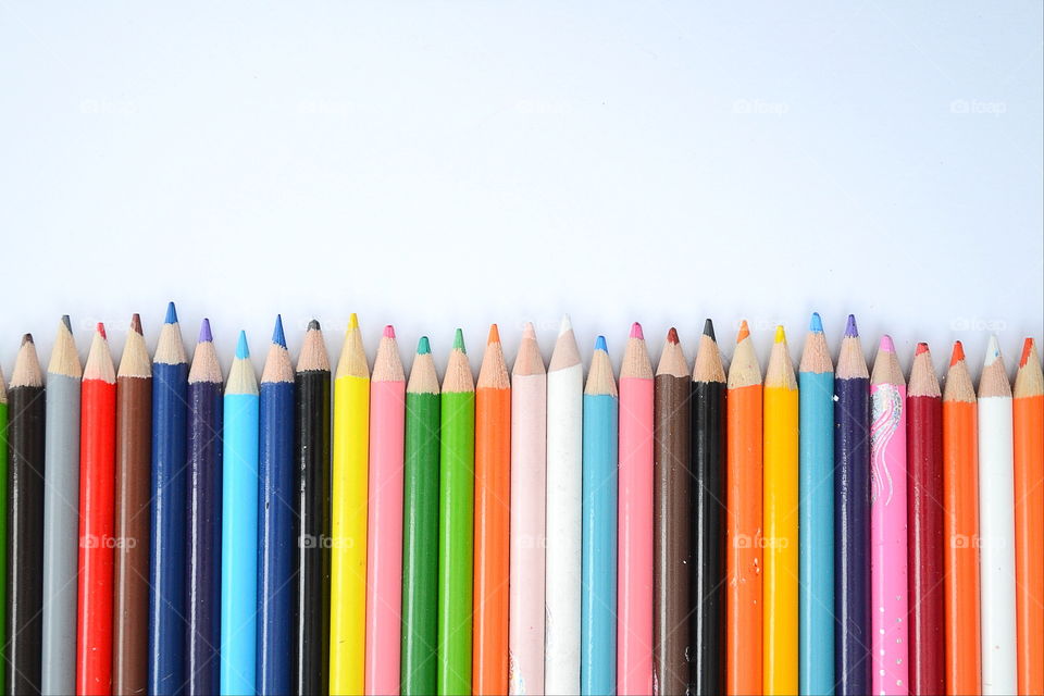 High angle view of multi coloured pencils