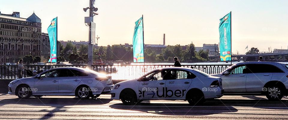 Uber car on Tuchkov bridge in St. Petersburg, Russia