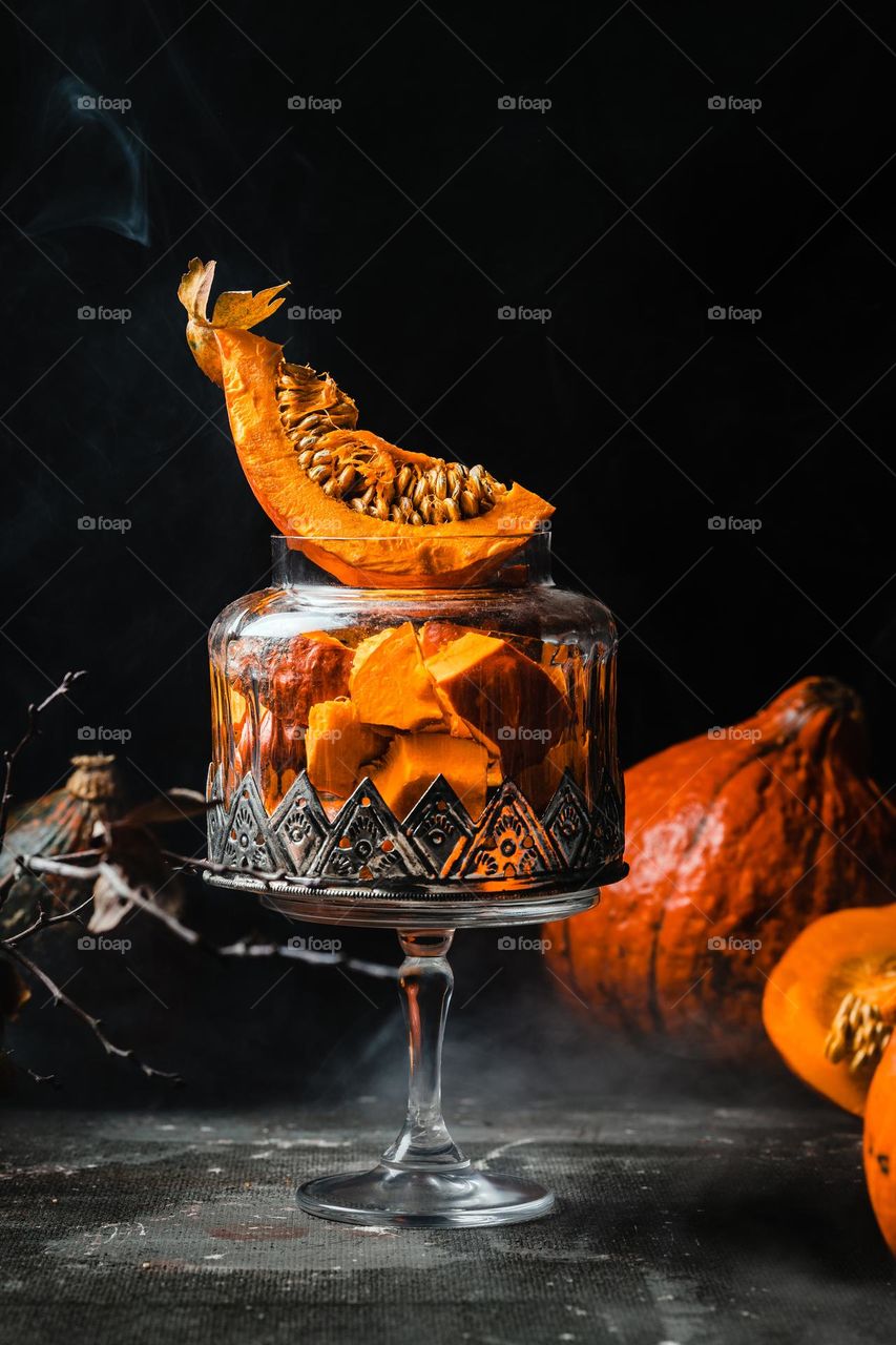 Close up studio shot of pumkin dark background. High quality photo