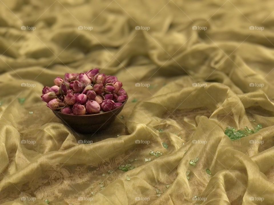 We were all fast sleep, and no one heard angels' footsteps when they brought us Damask roses.