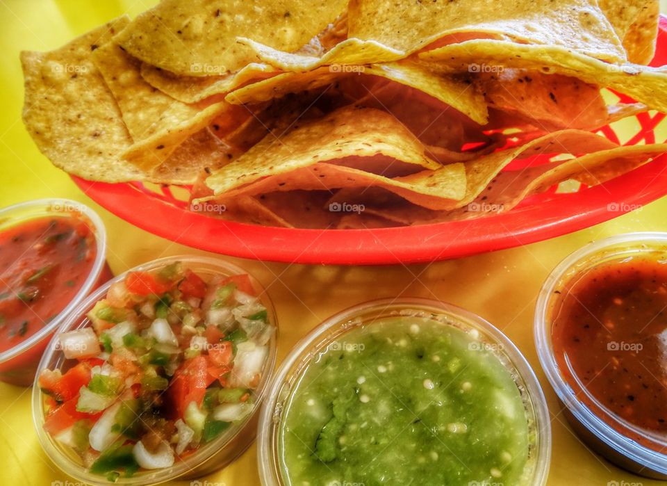 Tortilla Chips With Colorful Salsas. Spicy Snacks
