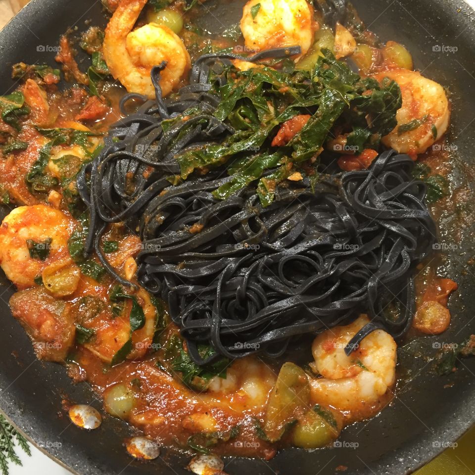 Squid ink pasta with spicy shrimp