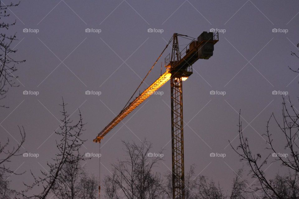 night view building crane lighting