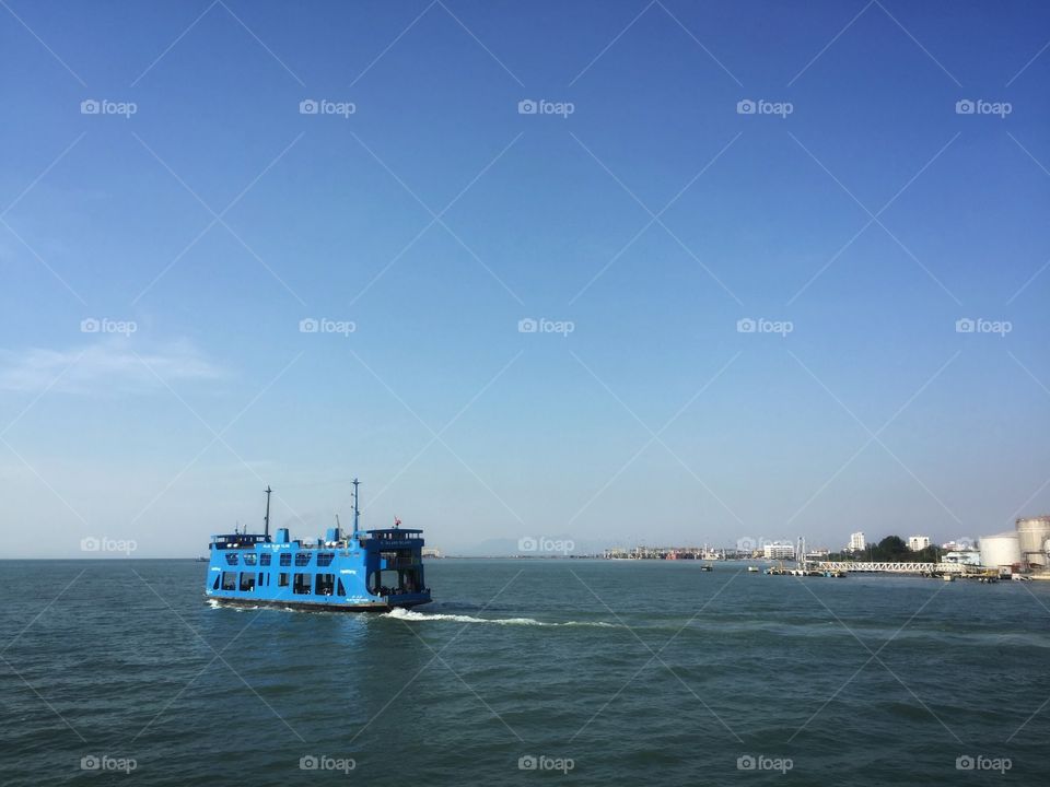 A blue painted island ferry.