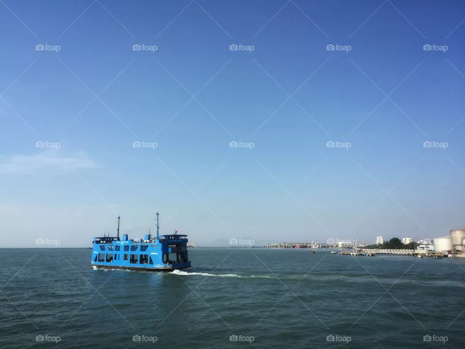 A blue painted island ferry.