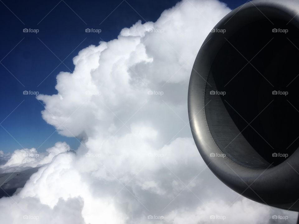 Airplane motor cloudy sky
