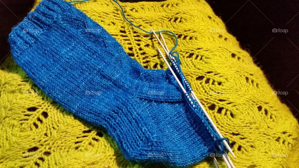 Knitting blue socks 