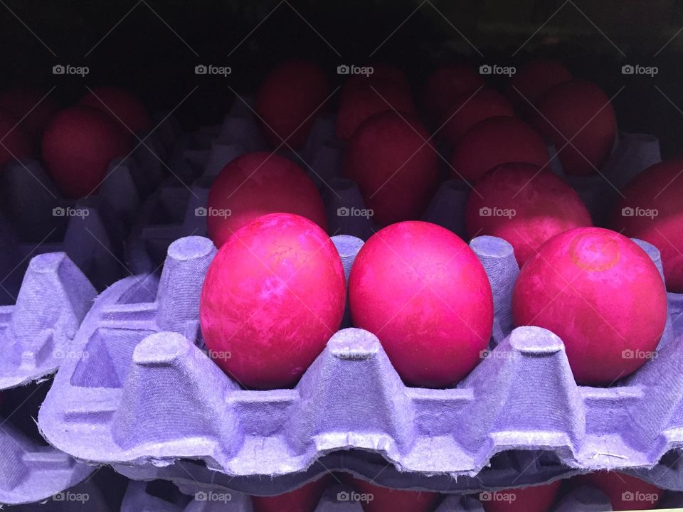 Pink Easter egg on carton
