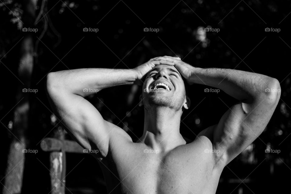 Man with a smile on his face street workout