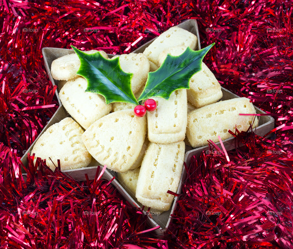 Christmas shortbread and red tinsel.