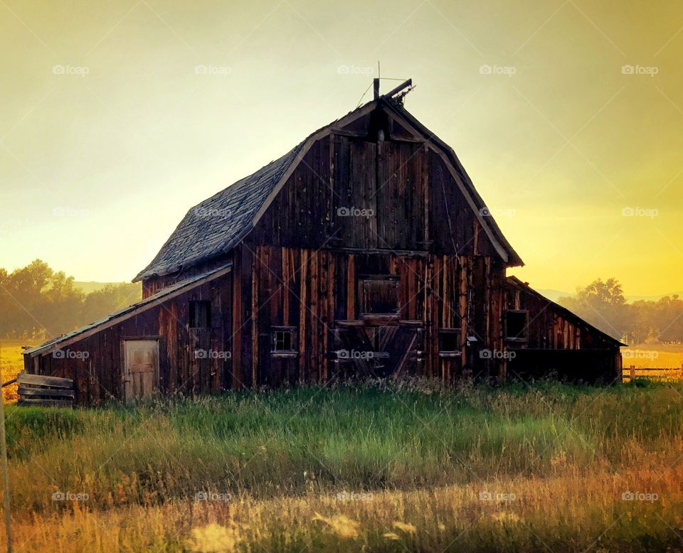 Old barn in smoky air 